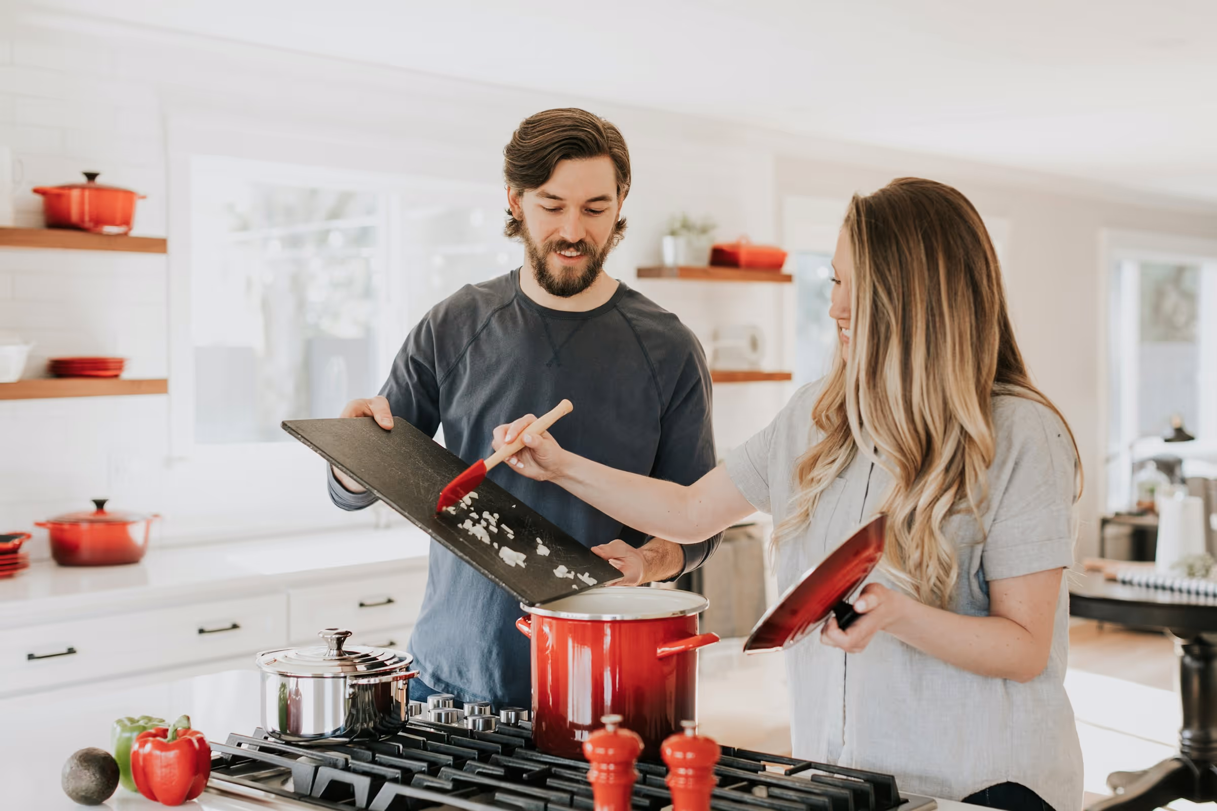 happy couple in their kitchen