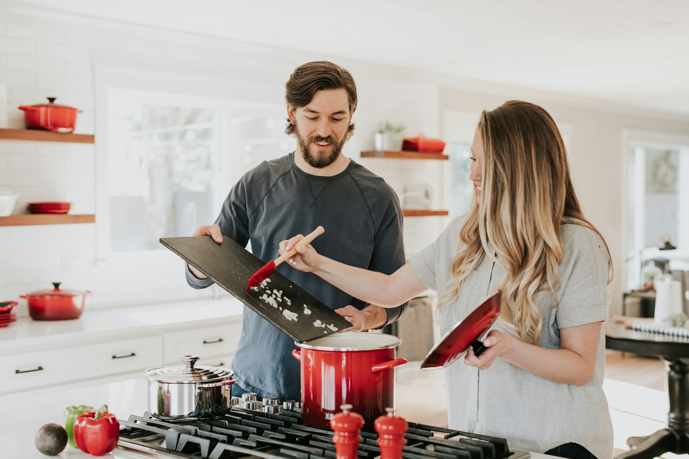 happy couple in their kitchen